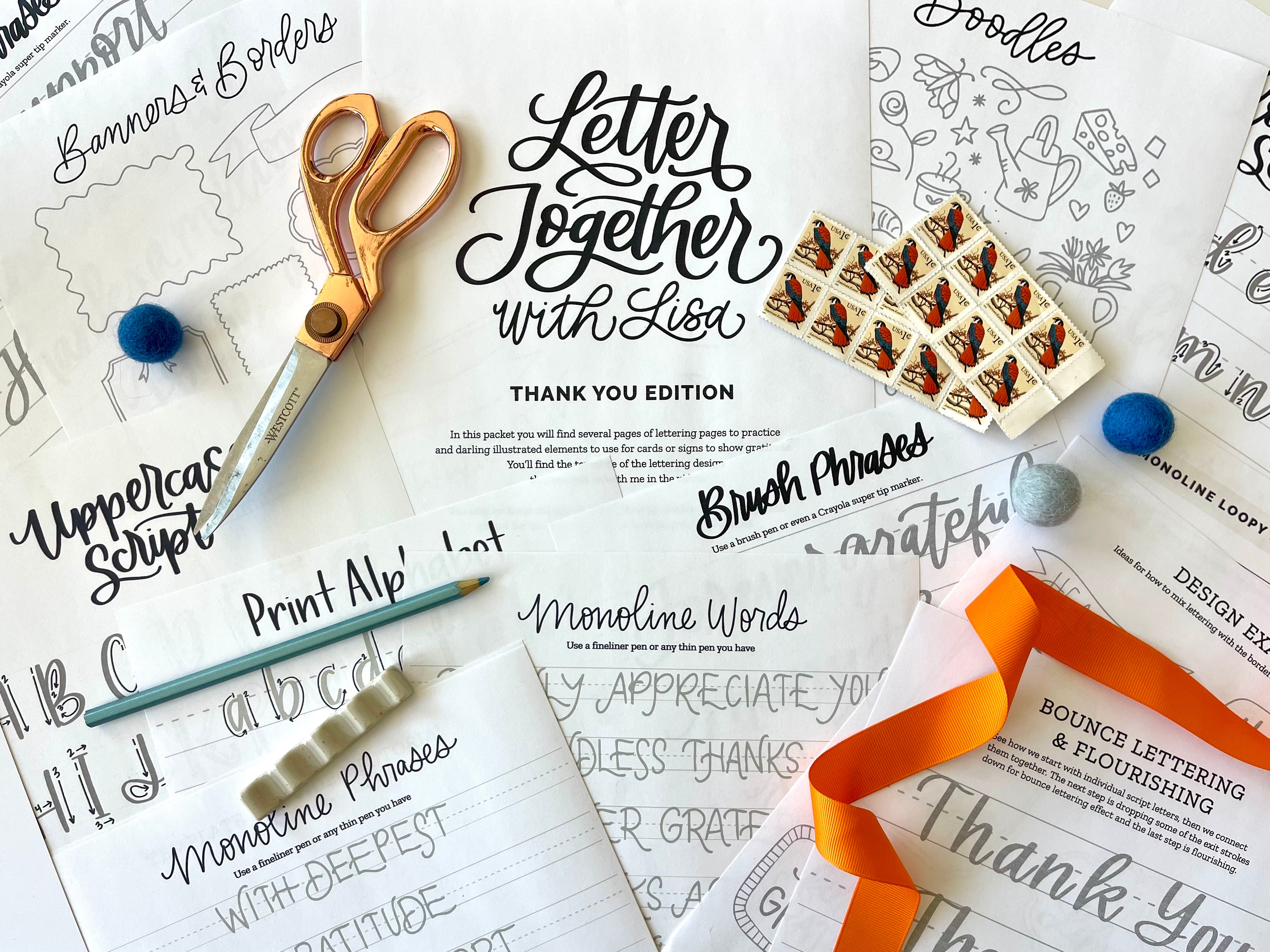 Collection of lettering practice sheets, stamps, and stationery items on a white background.